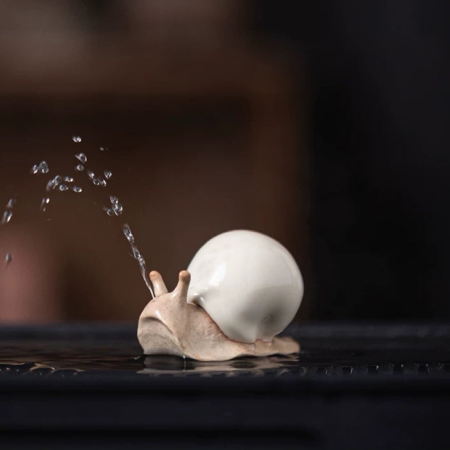 Squirting Tea Pets : Beige Snail Tea Pet - Seekcase